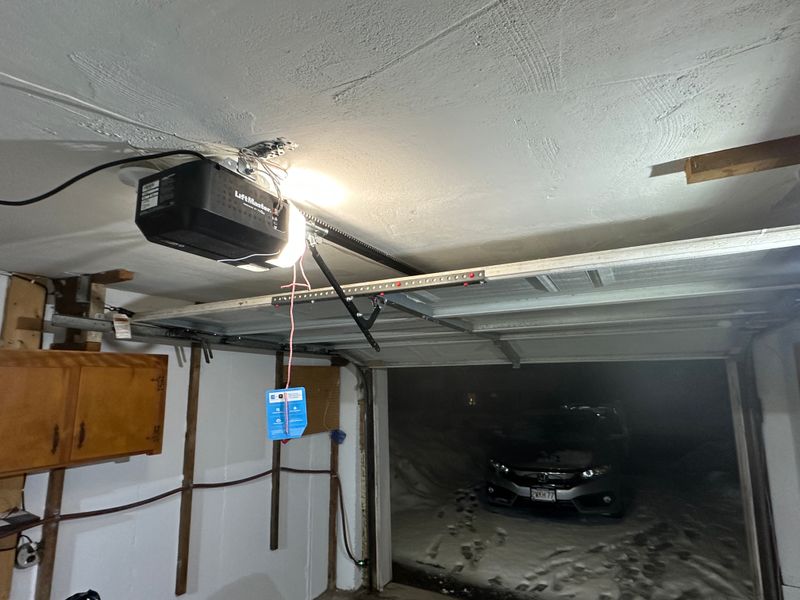 LiftMaster opener installed in residential garage with MyQ device in winter